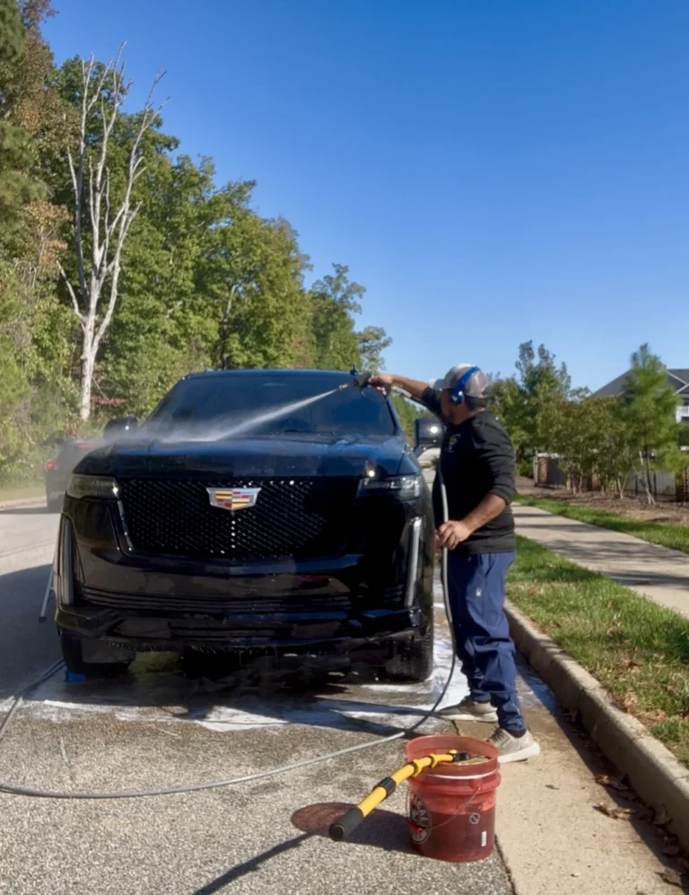 Castillo’s Detailing washing a Cadillac Escalade